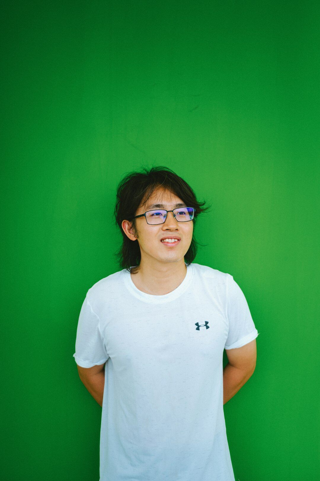 Studio portrait of a young female software engineer smiling